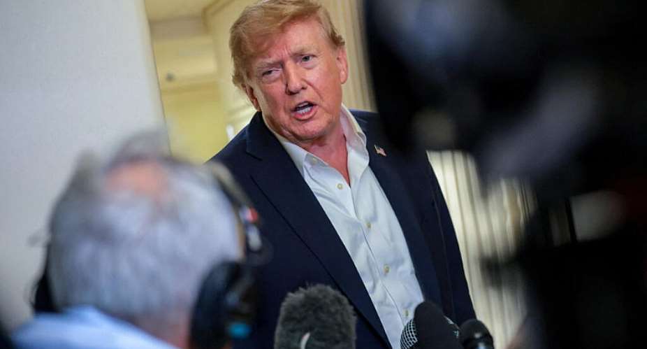 US President Donald Trump speaks to members of the media aboard Air Force One, en route to Joint Base Andrews, Maryland, on September 13, 2026. -  Kylie Cooper, Reuters
