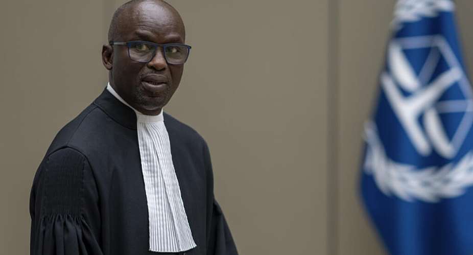Senegalese magistrate Mame Mandiaye Niang  Niang has taken over the ICCs Office of the Prosecutor, after his predecessor Karim Khan was dismissed over sexual abuse allegations he denies. - AP - Peter Dejong