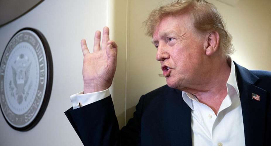 US President Donald Trump speaks to the press aboard Air Force One while flying to Joint Base Andrews, Maryland from Ireland on September 13, 2026 -  Brendan Smialowski, AFP
