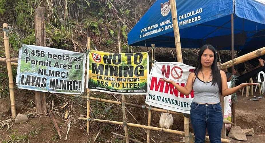 Environmental defender Leijin Dugay stands beside a barricade erected by residents to block access to a proposed mining project in Kasibu, Nueva Vizcaya, in the northern Philippines, on 15 September 2026. -  Kired for RFI