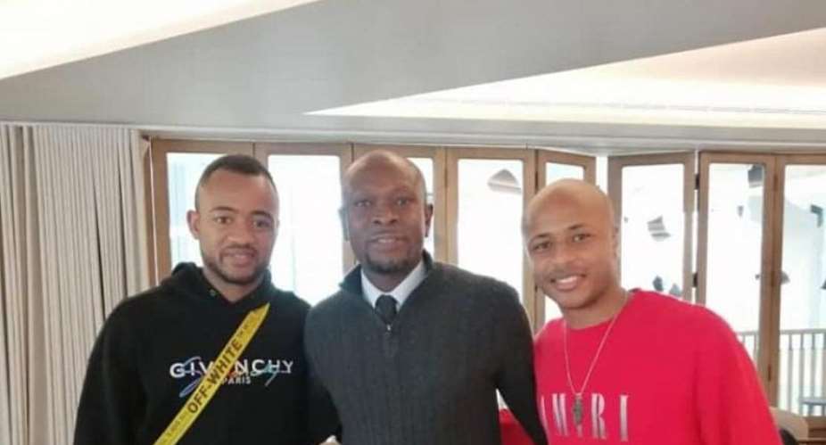 Jordan Ayew and his brother, Andre Ayew sandwich Coach Akonnor.