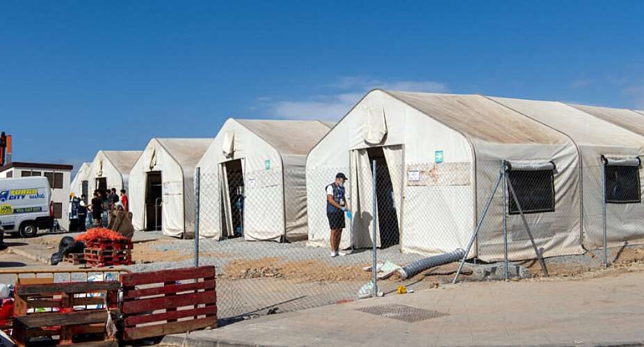 This picture shows large tents at the new Los Rosales migrant reception camp, where more than 800 people have been transferred from the Loma Colmenar camp, in Ceuta, on September 12, 2026. -  Antonio Sempere, AFP