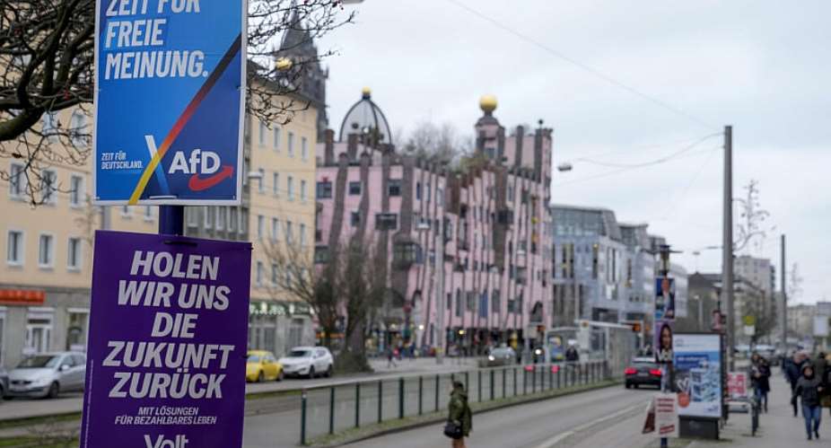 An election poster for the far-right, anti-immigration party Alternative for Germany (AfD), reading Its time for free opinion, in Magdeburg, 7 February 2025. -   Ebrahim Noroozi / AP