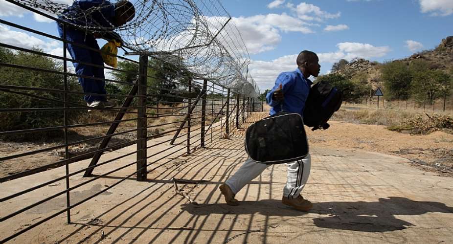 Zimbabwean migrants illegally cross Into South Africa. - Source: John MooreGetty Images