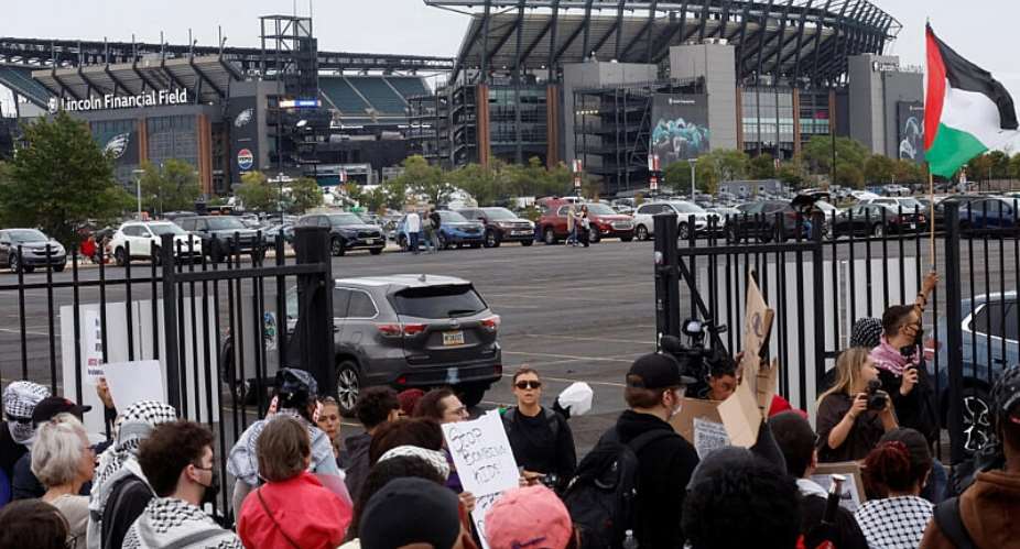 Pro-Palestinian protesters demonstrate near the venue of pop star Ed Sheerans concert after rapper Macklemore was cut from the musical lineup over his free Palestine remarks on stage criticizing Israeli government actions in Gaza and the West Bank, near Lincoln Financial Field in Philadelphia, Pennsylvania, US, September, 19, 2026. -  Eduardo Munoz, Reuters