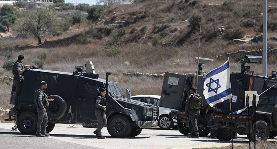 Israeli security forces guard the site of a shooting attack near the settlement of Neve Tzuf, north of the West Bank city of Ramallah, September 20, 2026.  Mahmoud Illean, AP