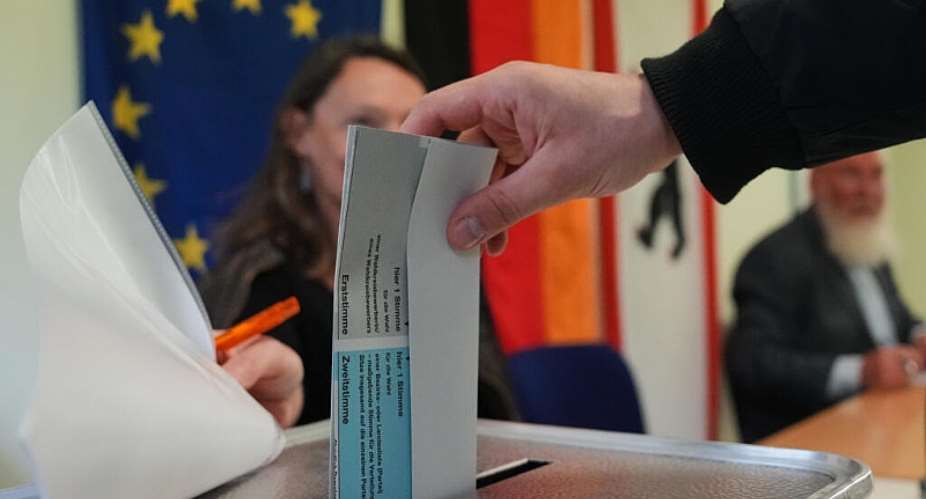 A man casts his vote at a polling station during the Berlin state election in Berlin, Germany, Sunday, Sept. 20, 2026. -  Markus Schreiber, AP