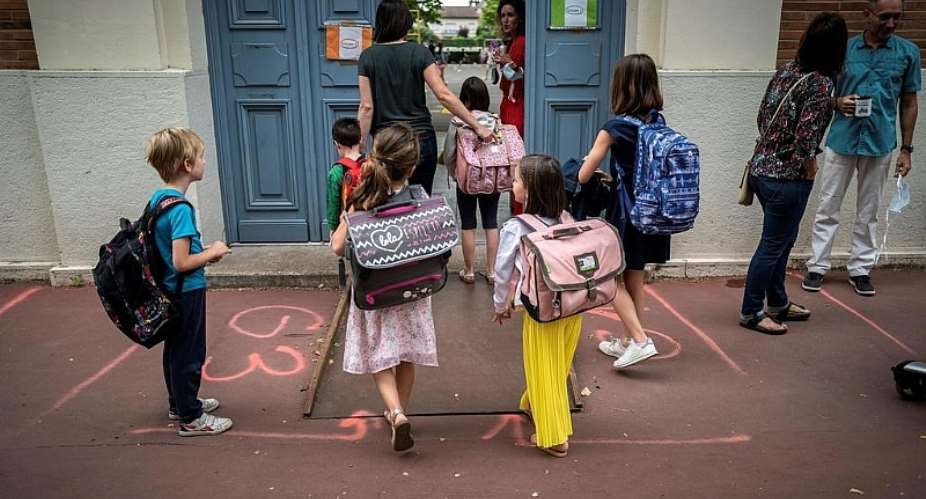 France eases Covid restrictions in primary schools despite rising cases