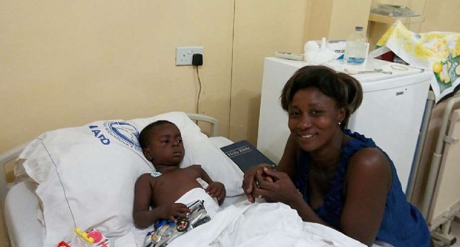 Ernest Opuni and mother after the surgery