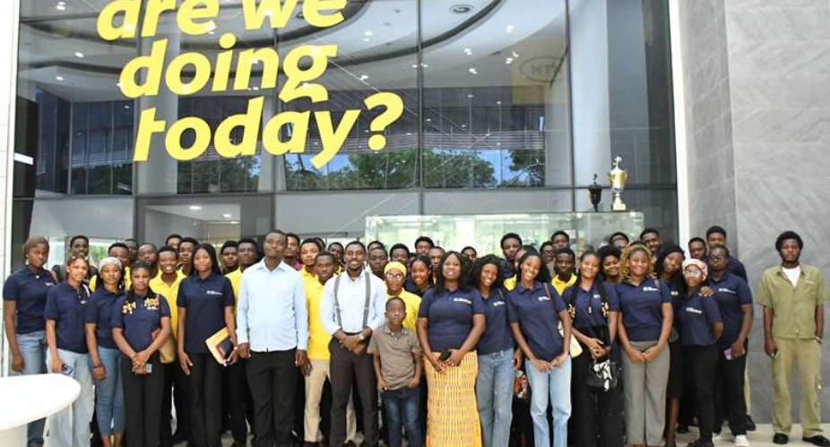 Dr. Augustina Dede Agor with an MTN Ghana professional and Day 1 participants from the UPSA Developers Hub.