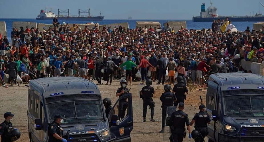File photo of migrants from Morocco in the Spanish exclave of Ceuta taken August 21, 2026. -  Antonio Sempere, AP