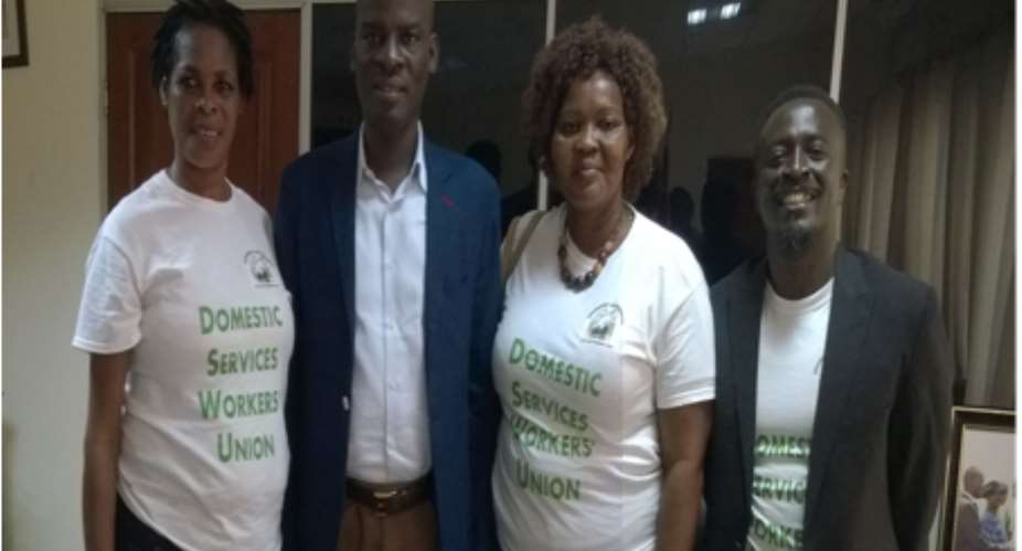 Minister for Employment and Labour Relations, Hon. Haruna Iddrisu, flanked by DSWU National Officers; Sis. Esther Kosi, DSWU General Secretary Ministers right, Sis. Eva Attakpah, National Chairperson, and Amewuga Ablordeppey, Administrator.