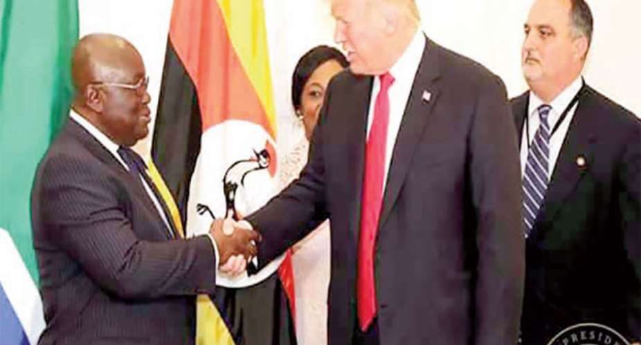 President Akufo-Addo in a handshake with President Trump