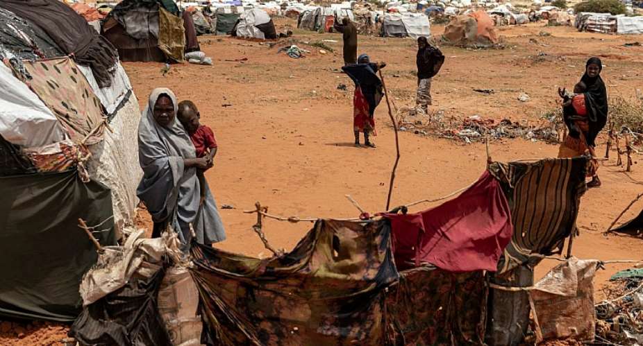 Millions of people fled conflict and severe drought in Somalia in 2026, many arriving at this internally displaced persons camp outside Kismayo town. Simon Maina/AFP/Getty Images