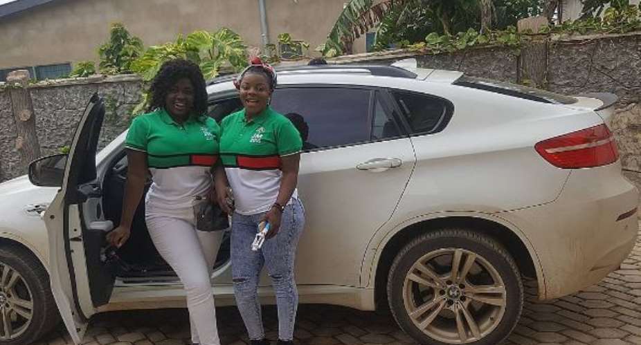 Tracey Boakye left with a friend by her car