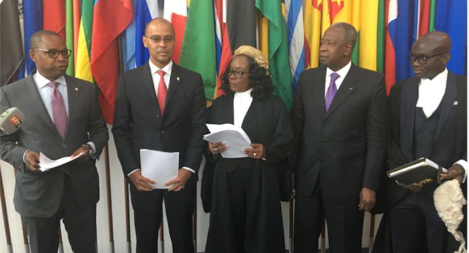 The Ghanaian legal team their Ivorian counterparts