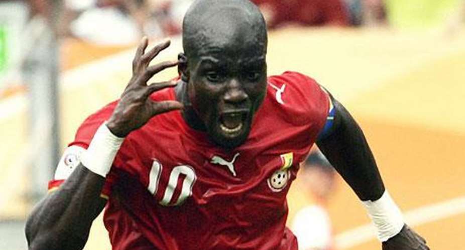 STEPHEN APPIAH CELEBRATES AGAINST USA AFTER SCORING A WINNING PENALTY
