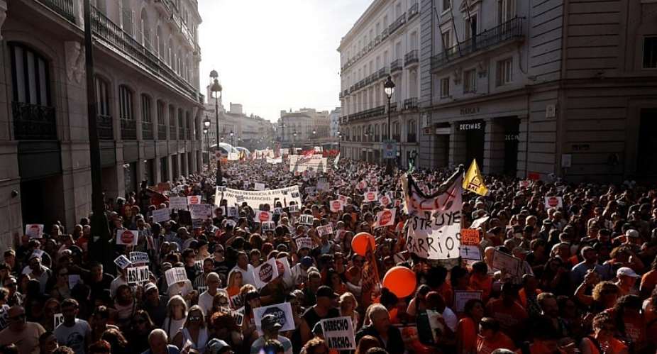 Protesters chanted slogans and held banners calling for measures to make evictions more difficult. -  Oscar del Pozo, AFP