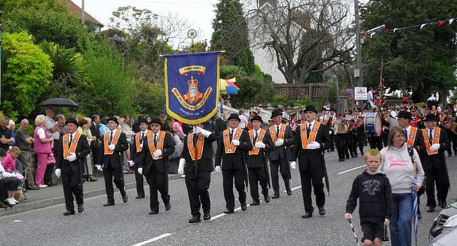 The Portadown District Loyal Orange Lodge return from the Demonstration Field along the Hamiltonsbawn Road in Armagh during the County Armagh 12th July parades 2009. -  Wikimedia commons