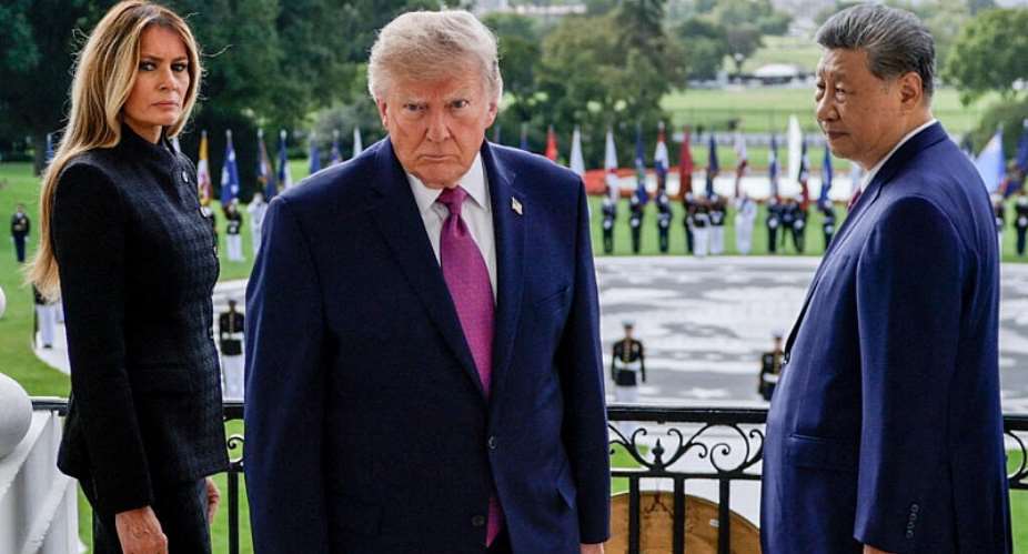 US President Donald Trump, First Lady Melania Trump and Chinese President Xi Jinping after watching a military demonstration from a balcony of the White House in Washington, DC, on September 24, 2026. -  Evan Vucci, Reuters