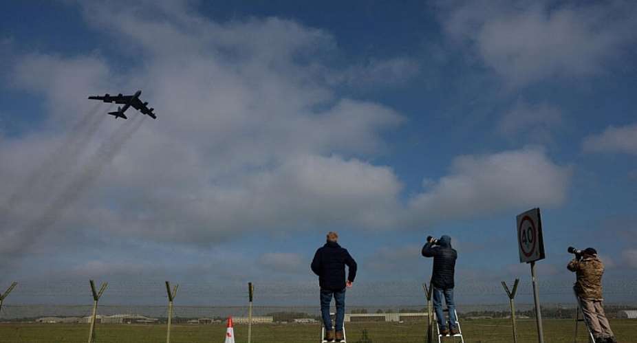 Plane spotters watch as a Boeing B-52 Stratofortress takes off at RAF Fairford airbase, which hosts United States Air Force (USAF) personnel, amid a ceasefire between the United States and Iran, in Fairford, Gloucestershire, Britain, April 23, 2026. - REUTERS - Hannah McKay