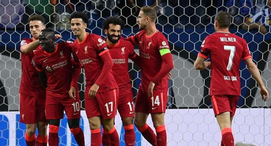 UCL: Salah, Firmino shine as Liverpool honour Hunt with Porto rout