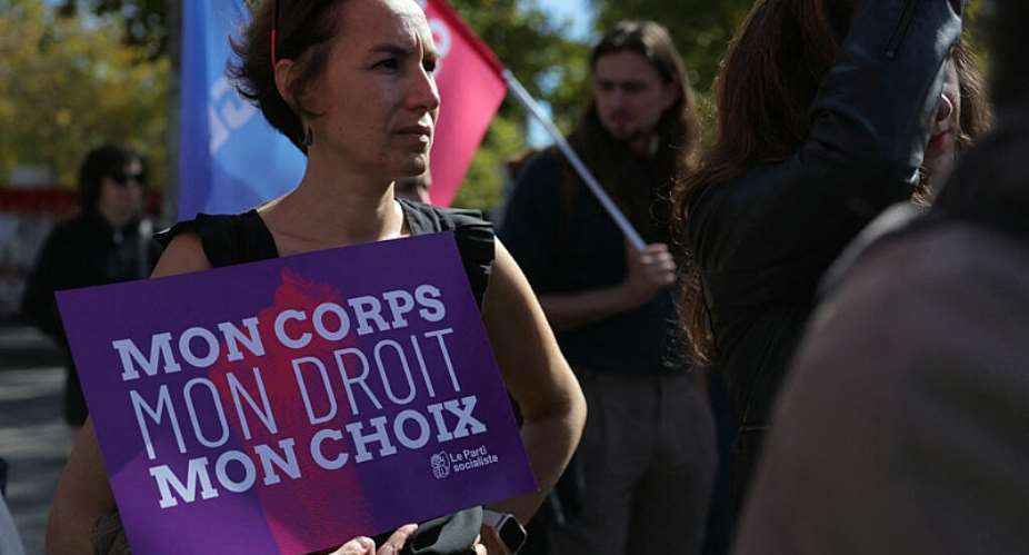 A woman holds a placard reading My body, my right, my choice during a demonstration for the right of abortion on the occasion of International Safe Abortion Day in Paris on 28 September 2025. - AFP - THOMAS SAMSON