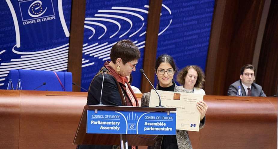Mehraveh Khandan Heris accepts the Vaclav Havel Human Rights Prize on behalf of her mother, Iranian lawyer Nasrin Sotoudeh, during a ceremony at the Council of Europe in Strasbourg, France, 28 September, 2026. - AFP - HANDOUT