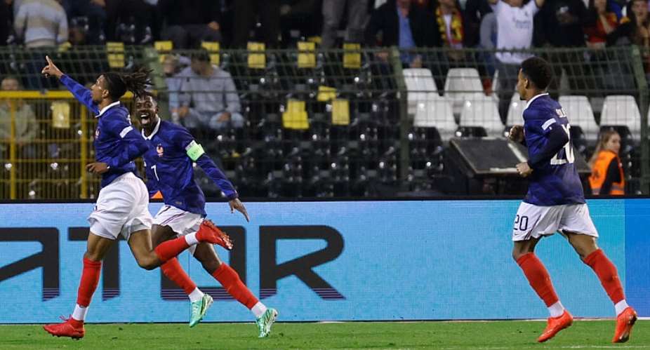 Michael Olise (left) celebrates with France teammates Ousmane Dembl (centre) and Dsir Dou (right) after scoring against Belgium in the Nations League clash in Brussels, - AP Photo/Geert Vanden Wijngaert - Geert Vanden Wijngaert