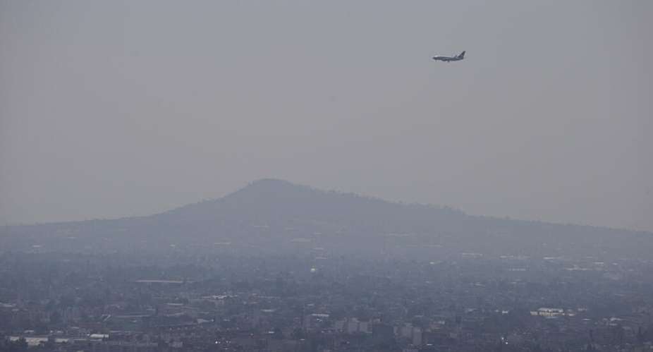 Haze over Mexico City, where high levels of ground-level ozone have contributed to poor air quality. - AP - Rebecca Blackwell