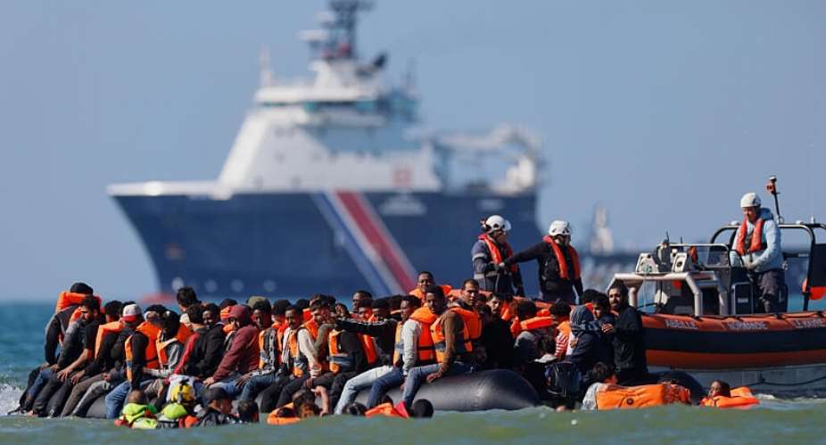 A group of people try to cross the Channel from France to Britain on a dinghy boat, in Hardelot, northern France, Wednesday, September 23, 2026. -  Jean-Franois Badias, AP