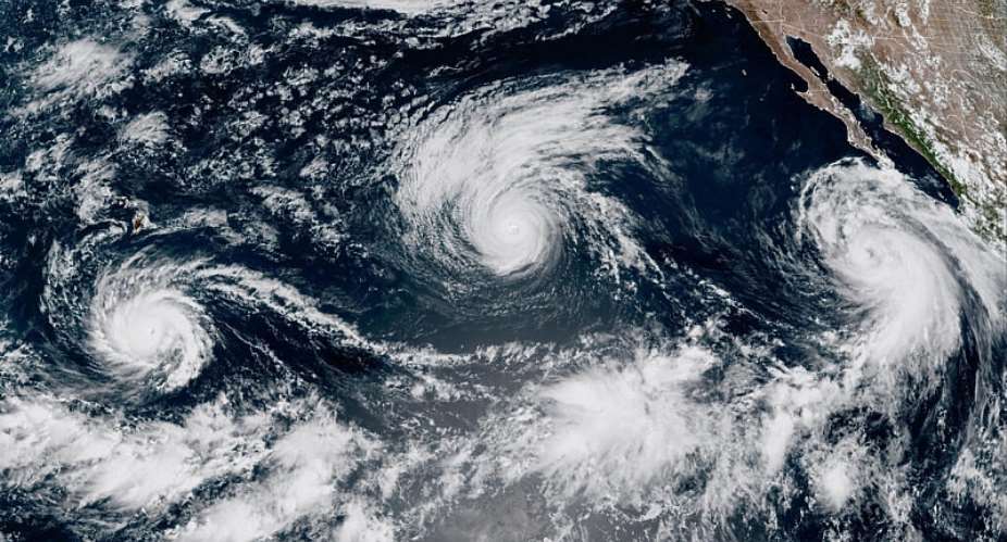 Hurricanes Lowell and Karina and Tropical Storm Marie churn across the Pacific Ocean on 2 September 2026. -  CIRA/NOAA via AP