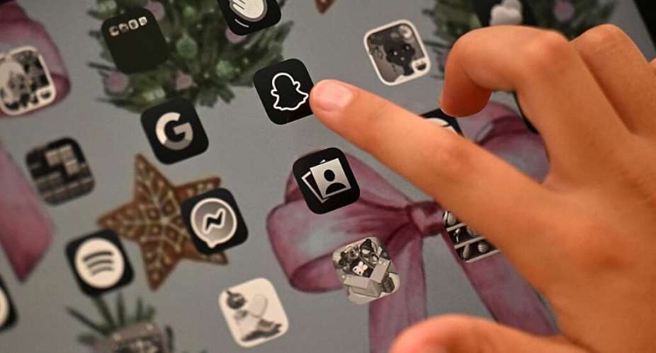 EU lawmakers are urging Brussels to force Meta to introduce stronger protections for children in Europe, after the company agreed to sweeping new limits on teenage use of Facebook and Instagram in the United States. - AFP - SAEED KHAN