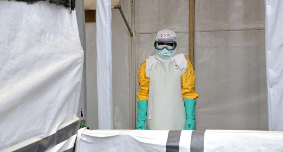 A health worker pauses after disinfecting a treatment center for Ebola patients, in Beni, eastern DRC, 31 August 2026. -  Sebastien Kitsa Musayi/AP