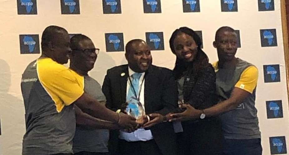 From Left Mr Kwarteng, Mr Osman, Mr Honya President Of ACCPA Presenting The Award, Ms Opoku And Mr Asante