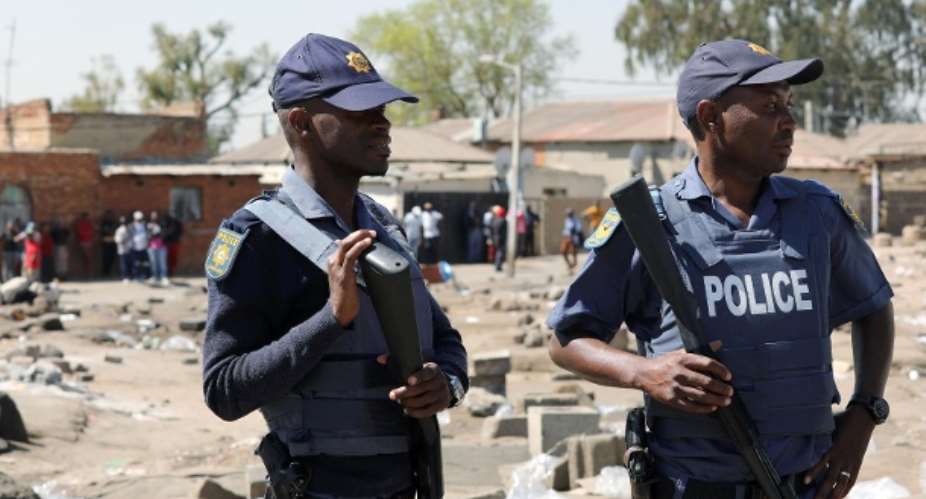 Police officers in a township of Johannesburg, many people killed in attack