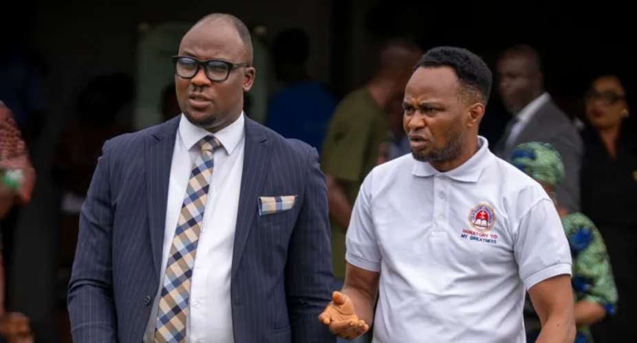 BBCAdeniyi Mobolaji Kayode, right, leaves court with his lawyer on Thursday