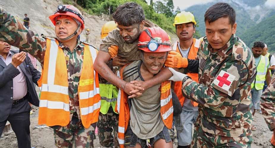 In this photo provided by the Nepal Army, soldiers rescue a worker alive from a tunnel during an ongoing operation at the Trishuli-3A hydropower project in Nepals Rasuwa district on September 4, 2026. - Nepal Army via AP