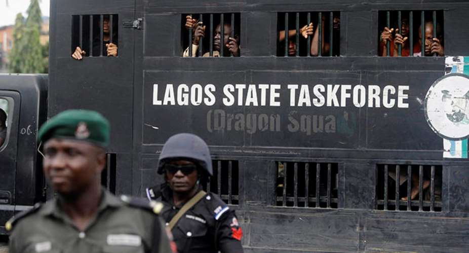 Police officers are seen in Lagos, Nigeria, on August 5, 2019. Lagos police recently arrested publisher Agba Jalingo, who has been charged by federal authorities with treason. APSunday Alamba