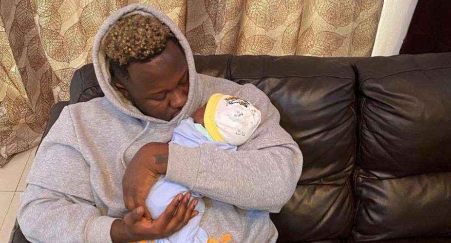 Medikal Shares Stunning Photo Of His Newborn Child