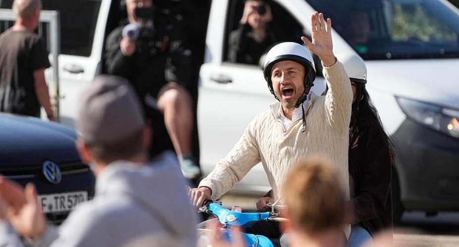 Ulrich Siegmund, top candidate for the AfD party arrives with his wife Julia on a small Schwalbe motorcycle for his voting at a polling station during the Saxony-Anhalt state elections in Tangermuende, eastern Germany, on September 6, 2026. -  Matthias Schrader, AP