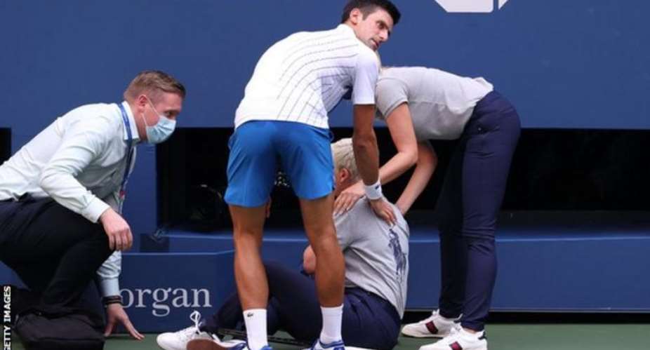 Novak Djokovic checked on the line judge after hitting her with a ball when he was 6-5 down in the first set