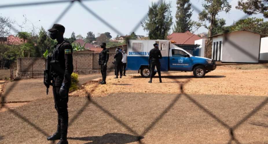 Police officers are seen at a court in Kigali, Rwanda, on September 14, 2020. Prosecutors recently requested 22-year prison sentences for three journalists with Iwacu TV. ReutersJean Bizimana