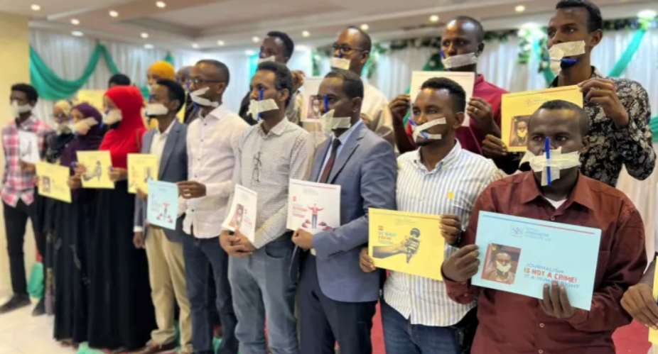 Members of the Somali Journalists Syndicate and local journalists protest the persecution of secretary general Abdalle Ahmed Mumin, third from right, in a December 2022 photo. Mumin fled to Kenya and then to the U.K. after he was repeatedly arrested. This year, the SJS website was the target of cyberattacks. Photo courtesy SJS