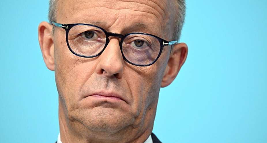 German Chancellor Friedrich Merz speaks to the press, one day after his party suffered a crushing state election defeat at the hands of the far-right AfD. -  Ralf Hirschberger, AFP
