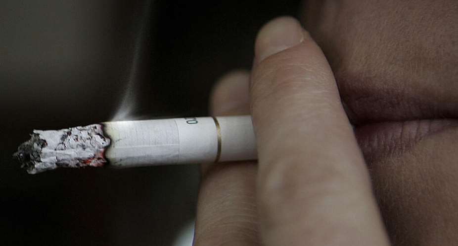A smoker in a pub in London, Feb. 14, 2006. -  Kirsty Wigglesworth, AP