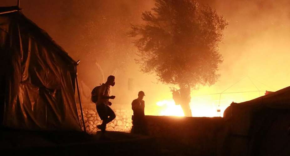Migrant hopes go up in smoke as Greece's Moria camp burns to the ground