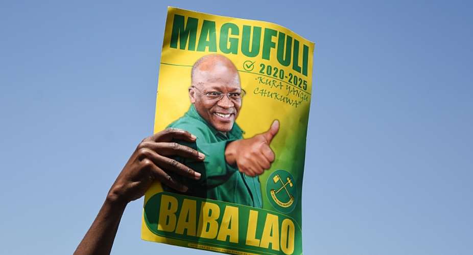 A campaign poster of John Magufuli of the ruling Chama Cha Mapinduzi party who is seeking re-election as president in October.   - Source: Ericky BoniphaceAFP via Getty Images