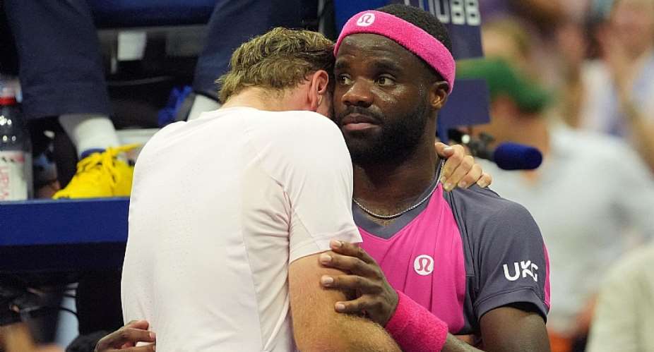 ReutersImage caption: Frances Tiafoe (right) hugged compatriot Alex Michelsen at the net, with the two good friends off the court