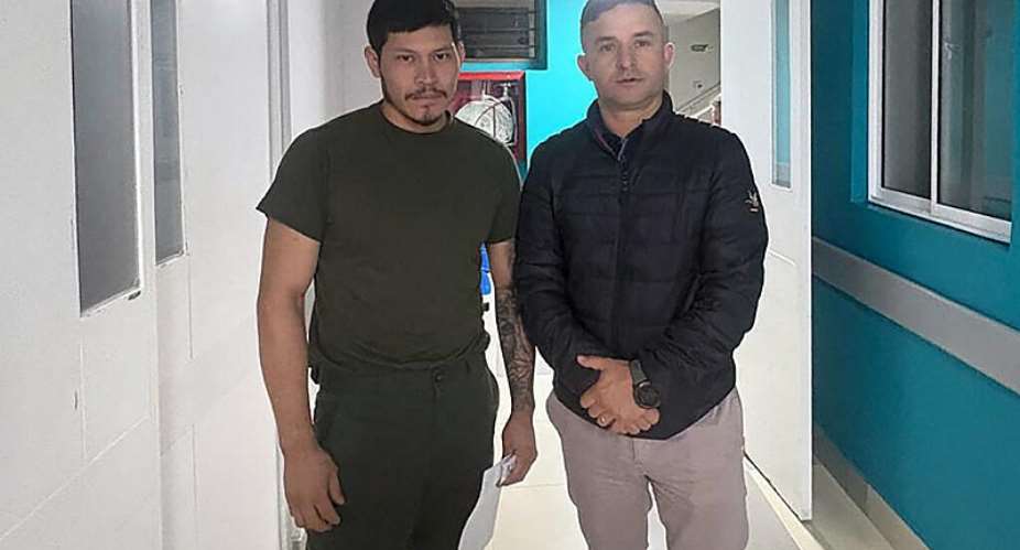 Jose Melo Charry (L) after escaping from the guerrillas who held him captive in Pasto, Colombia, on September 6, 2026. -  Handout via Colombian Military Forces, AFP